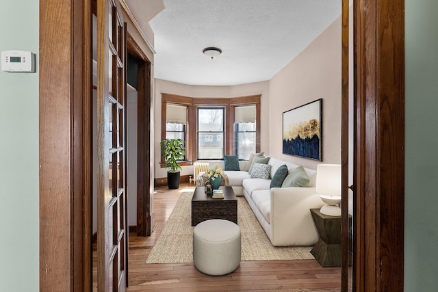 living area featuring hardwood / wood-style floors