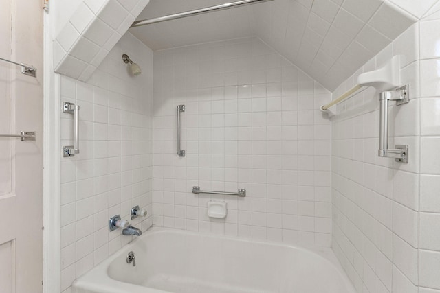 bathroom featuring washtub / shower combination