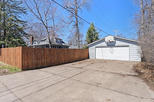 detached garage with fence