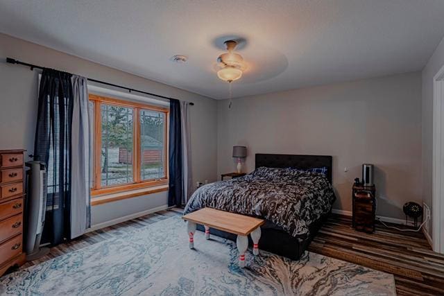 20371 Golf Crest Dr, Grand Rapids, MN 55744 - bedroom with baseboards and wood finished floors