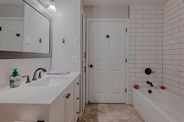 20371 Golf Crest Dr, Grand Rapids, MN 55744 - full bath with vanity and shower / washtub combination