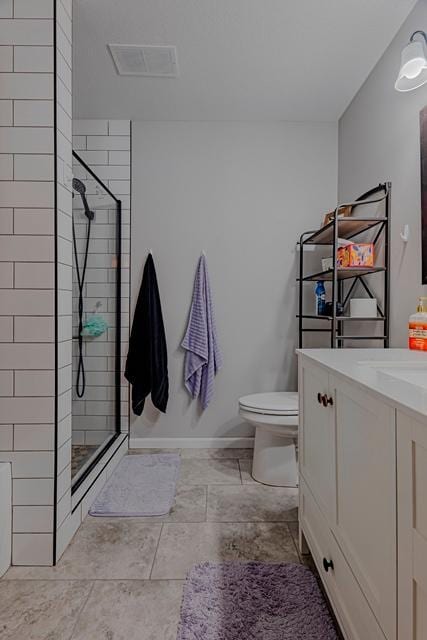 20371 Golf Crest Dr, Grand Rapids, MN 55744 - full bathroom featuring a stall shower, toilet, vanity, and baseboards