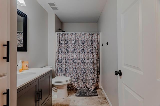 20371 Golf Crest Dr, Grand Rapids, MN 55744 - bathroom with vanity, toilet, a shower with shower curtain, and tile patterned floors