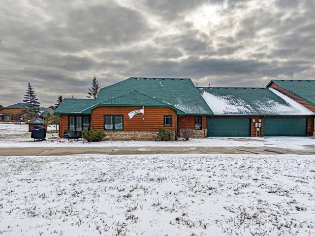 20371 Golf Crest Dr, Grand Rapids, MN 55744 - view of front facade with an attached garage and log veneer siding