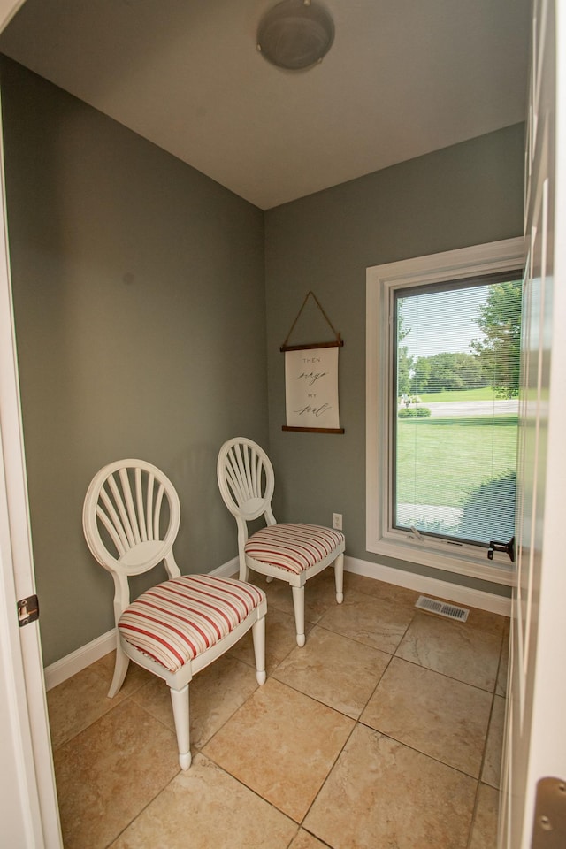 241 Cottonwood Cv, Lynd, MN 56157 - sitting room featuring baseboards, visible vents, and light tile patterned floors