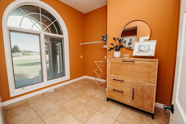 241 Cottonwood Cv, Lynd, MN 56157 - entrance foyer with baseboards, visible vents, and light tile patterned floors