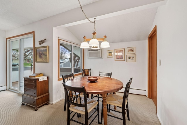 dining space with baseboards, light colored carpet, baseboard heating, and vaulted ceiling