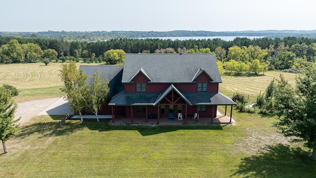 drone / aerial view with a forest view