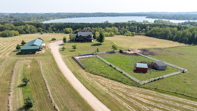 aerial view with a rural view, a water view, and a wooded view