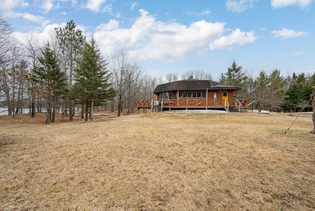 34130 Deer Lake Rd, Grand Rapids, MN 55744 - view of grassy yard with a wooden deck
