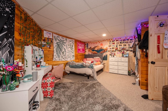 34130 Deer Lake Rd, Grand Rapids, MN 55744 - bedroom featuring a paneled ceiling, carpet, and wood walls