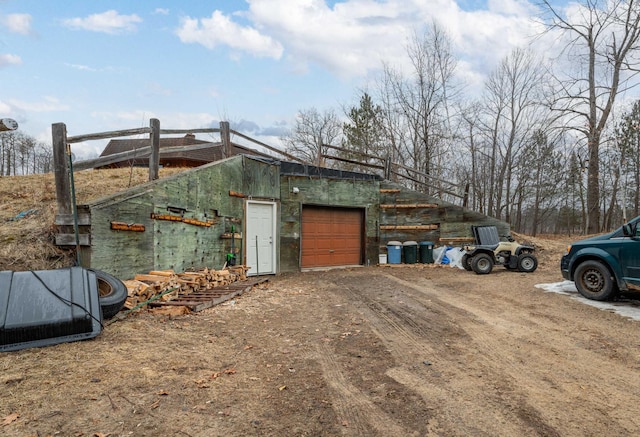 34130 Deer Lake Rd, Grand Rapids, MN 55744 - view of side of home featuring driveway and an outbuilding