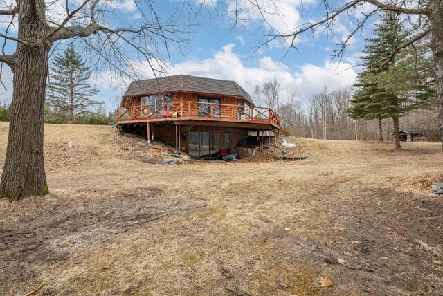 34130 Deer Lake Rd, Grand Rapids, MN 55744 - back of property featuring a deck and roof with shingles