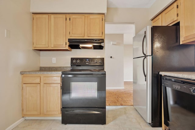 kitchen with light brown cabinetry, black appliances, under cabinet range hood, light countertops, and baseboards