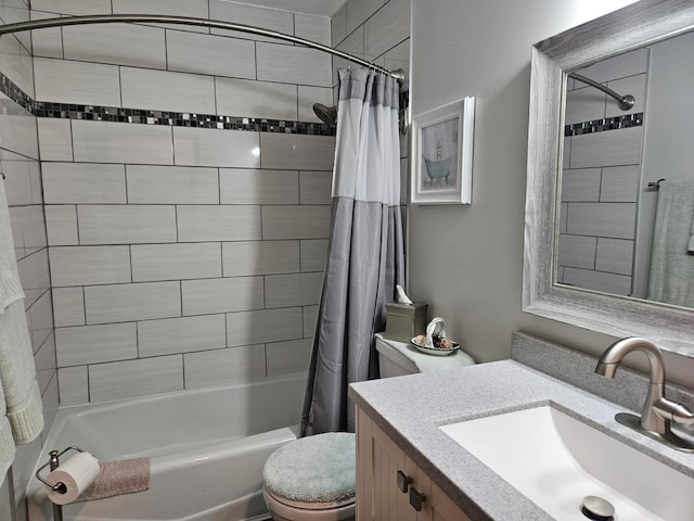 bathroom with shower / tub combo, toilet, and vanity