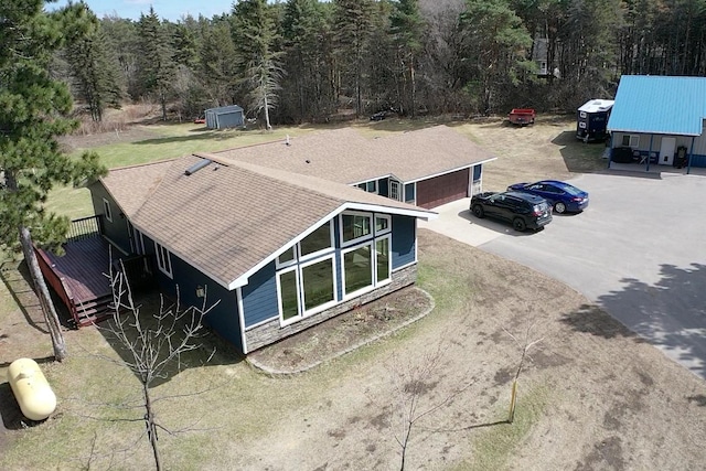 bird's eye view with a forest view
