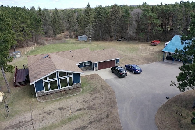 drone / aerial view with a forest view