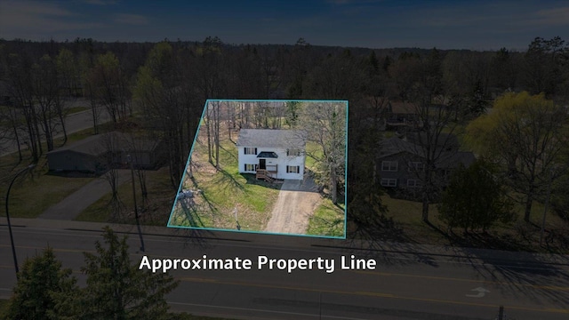 1607 7th Ave, Grand Rapids, MN 55744 - view from above of property featuring property boundaries highlighted and a heavily wooded area