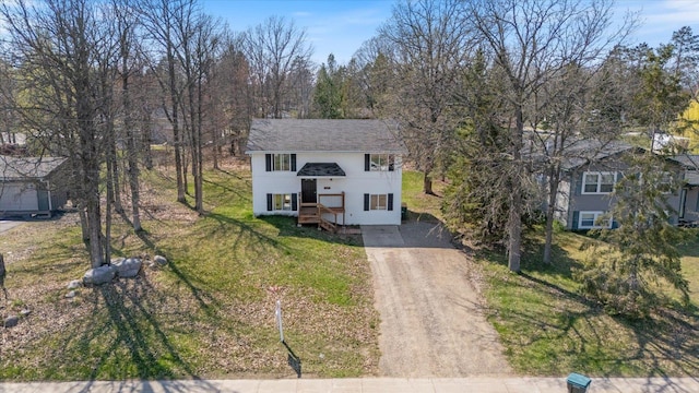 1607 7th Ave, Grand Rapids, MN 55744 - view of front of property with dirt driveway and a front lawn