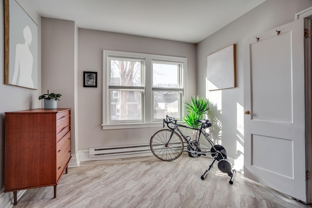 79 Western Ave N Unit 100, Saint Paul, MN 55102 - workout area featuring baseboard heating and baseboards