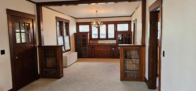 502 Park St S, Fairfax, MN 55332 - dining room with carpet flooring, a chandelier, and crown molding