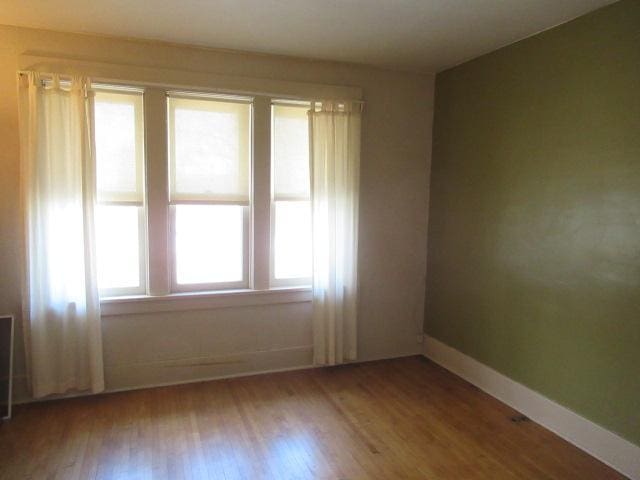 502 Park St S, Fairfax, MN 55332 - unfurnished room with wood finished floors and baseboards
