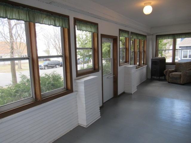 502 Park St S, Fairfax, MN 55332 - sunroom / solarium featuring a wood stove