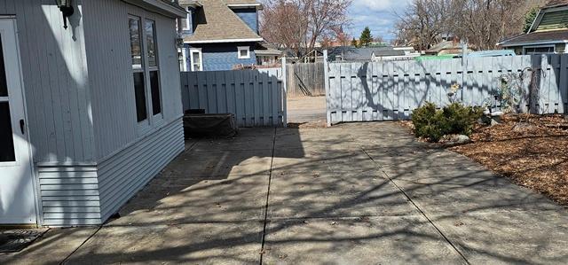 502 Park St S, Fairfax, MN 55332 - view of patio / terrace with fence and a residential view
