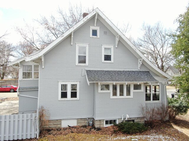 502 Park St S, Fairfax, MN 55332 - back of property with roof with shingles and a chimney