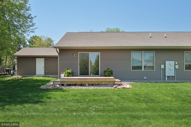 2615 Freeway Dr, Bloomer, WI 54724 - back of property with a lawn and a wooden deck