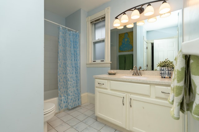 bathroom featuring tile patterned floors, shower / bath combo with shower curtain, vanity, and toilet