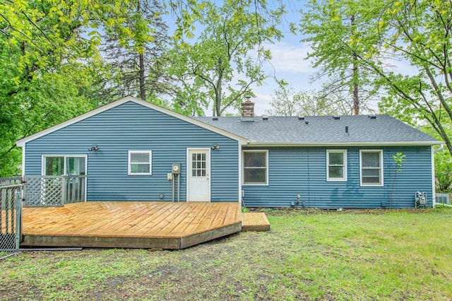 3401 Meadow Ln, Minnetonka, MN 55345 - back of property with a chimney, a yard, a deck, and a shingled roof