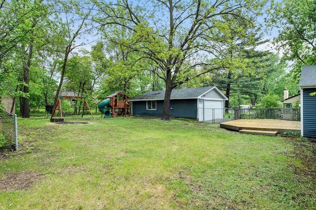 3401 Meadow Ln, Minnetonka, MN 55345 - view of yard featuring a playground, a garage, an outbuilding, and view of scattered trees