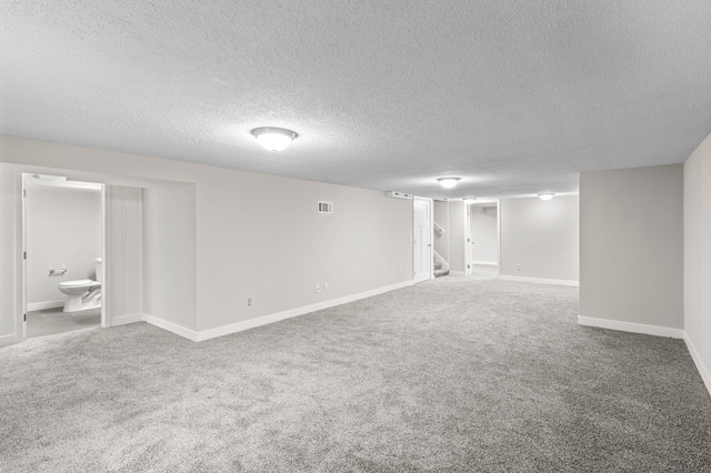 3401 Meadow Ln, Minnetonka, MN 55345 - finished basement with carpet flooring, a textured ceiling, and baseboards