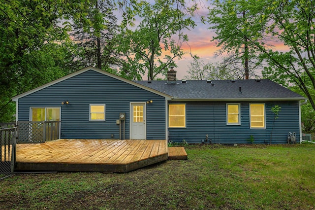 3401 Meadow Ln, Minnetonka, MN 55345 - back of house with a chimney, a yard, a deck, and a shingled roof