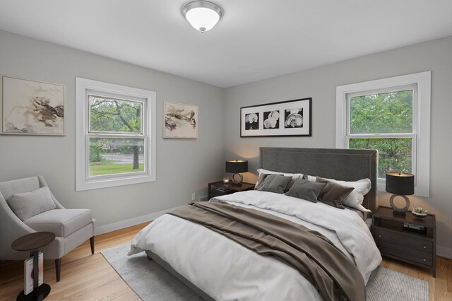 3401 Meadow Ln, Minnetonka, MN 55345 - bedroom featuring wood finished floors and baseboards