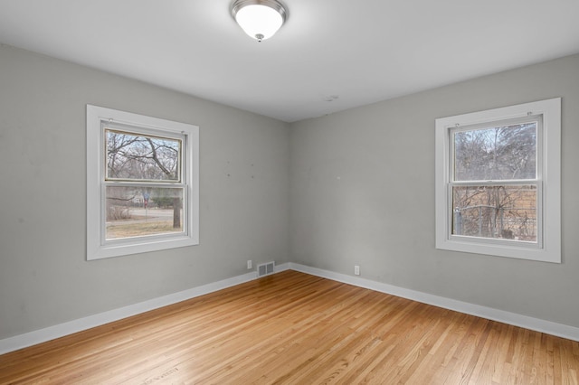 3401 Meadow Ln, Minnetonka, MN 55345 - unfurnished room featuring light wood-type flooring and baseboards
