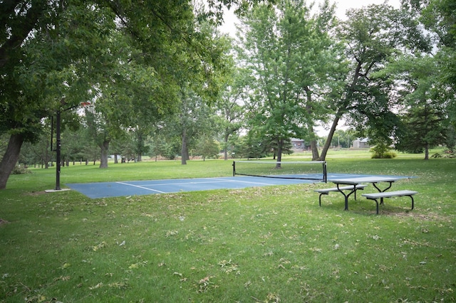 view of home's community featuring a lawn