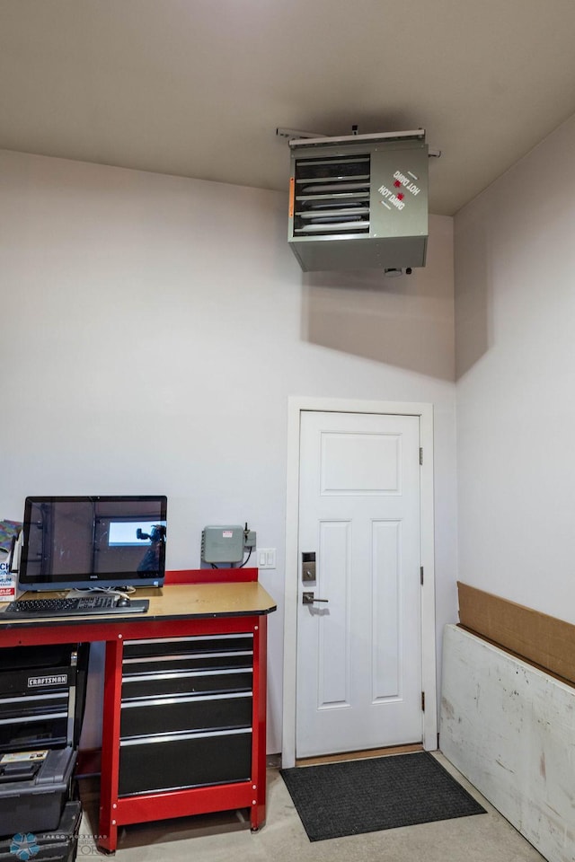 office space featuring a heating unit