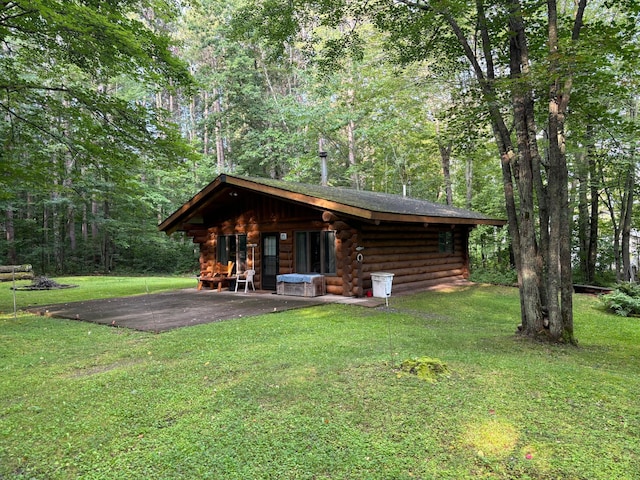 47241 186th Pl, Mcgregor, MN 55760 - log home featuring log exterior, a front lawn, and a forest view
