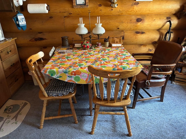 47241 186th Pl, Mcgregor, MN 55760 - dining area featuring carpet floors and rustic walls