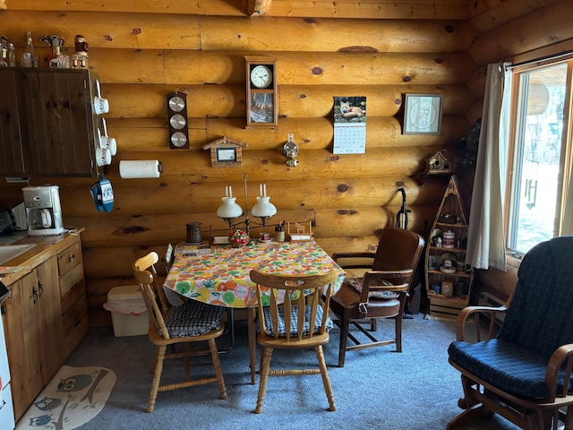47241 186th Pl, Mcgregor, MN 55760 - dining area featuring rustic walls, light colored carpet, and plenty of natural light