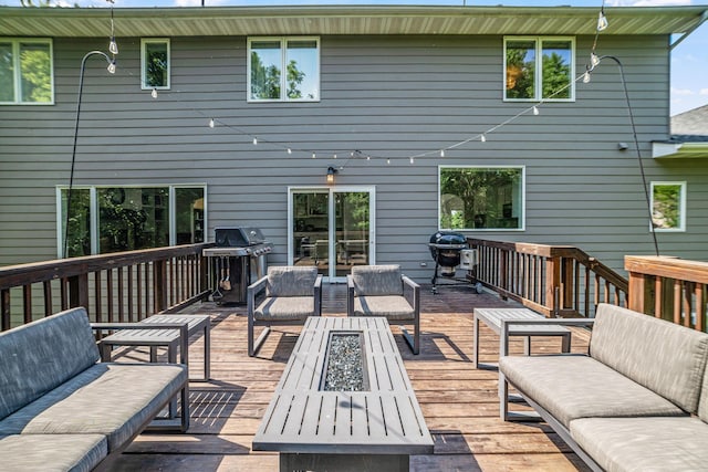 16500 Irwindale Way, Lakeville, MN 55044 - deck with an outdoor living space with a fire pit and area for grilling