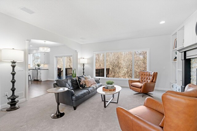 16500 Irwindale Way, Lakeville, MN 55044 - living room featuring carpet, arched walkways, recessed lighting, and baseboards