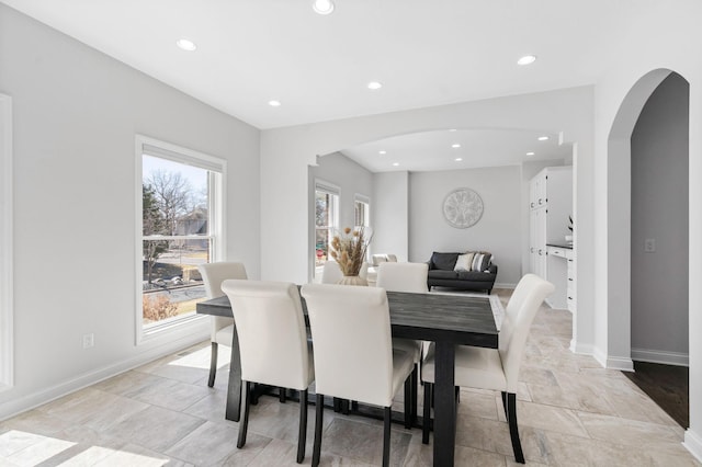 16500 Irwindale Way, Lakeville, MN 55044 - dining area featuring arched walkways, recessed lighting, and baseboards