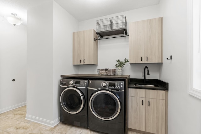 16500 Irwindale Way, Lakeville, MN 55044 - laundry area featuring washer and dryer, cabinet space, and baseboards