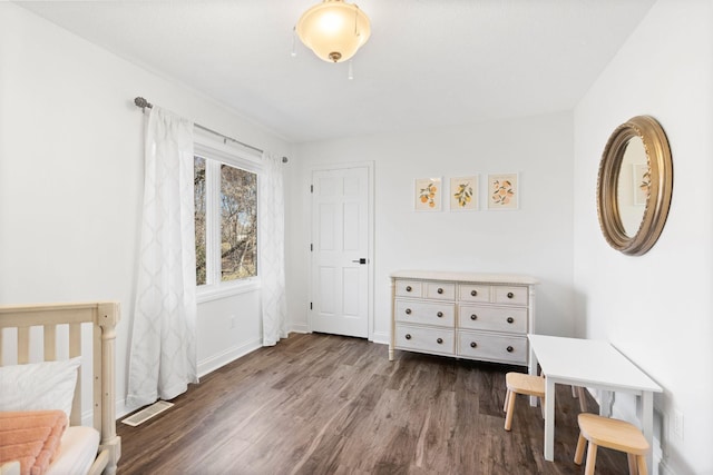 16500 Irwindale Way, Lakeville, MN 55044 - bedroom featuring dark wood finished floors and baseboards