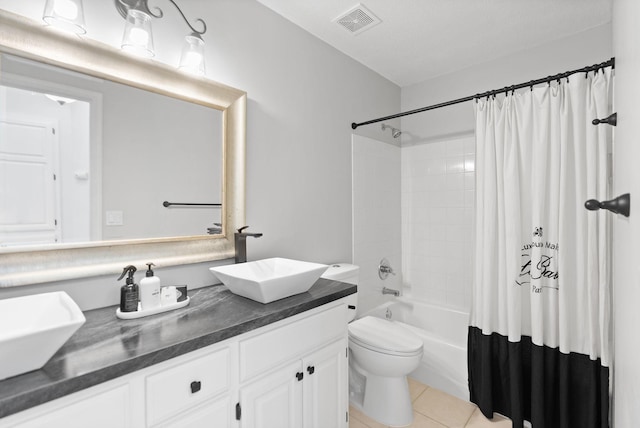 16500 Irwindale Way, Lakeville, MN 55044 - full bath featuring vanity, toilet, shower / tub combo with curtain, and tile patterned floors