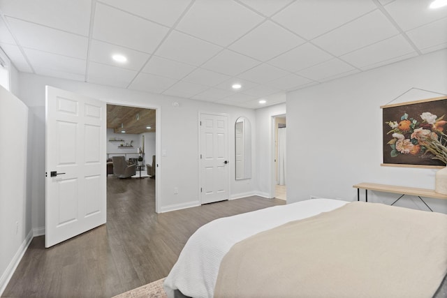 16500 Irwindale Way, Lakeville, MN 55044 - bedroom featuring wood finished floors, baseboards, a drop ceiling, and recessed lighting