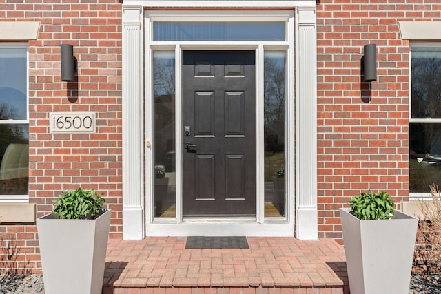 16500 Irwindale Way, Lakeville, MN 55044 - view of exterior entry featuring brick siding